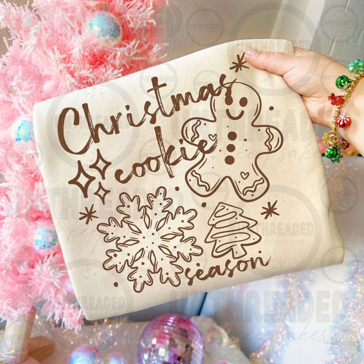 Christmas Cookie Season design on cream apparel