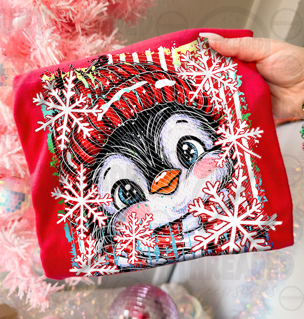 Red apparel mockup of Christmas penguin snowflake graphic