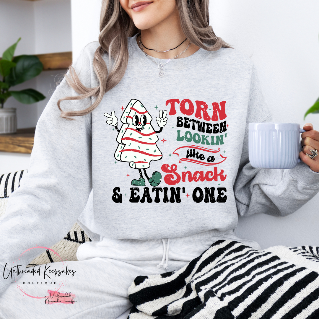 Torn Between Eatin a Snack and Looking Like One Christmas Tree Cake Women's Graphic Crewneck