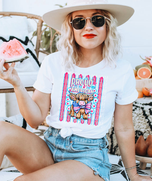 Proud to Be an American Cow Graphic T-Shirt | Patriotic Highland Cow Tee | USA Fourth of July Unisex Shirt | Red, White & Blue Americana Apparel