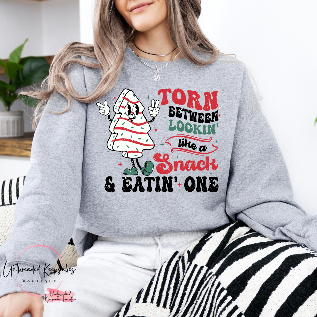 Torn Between Eatin a Snack and Looking Like One Christmas Tree Cake Women's Graphic Crewneck