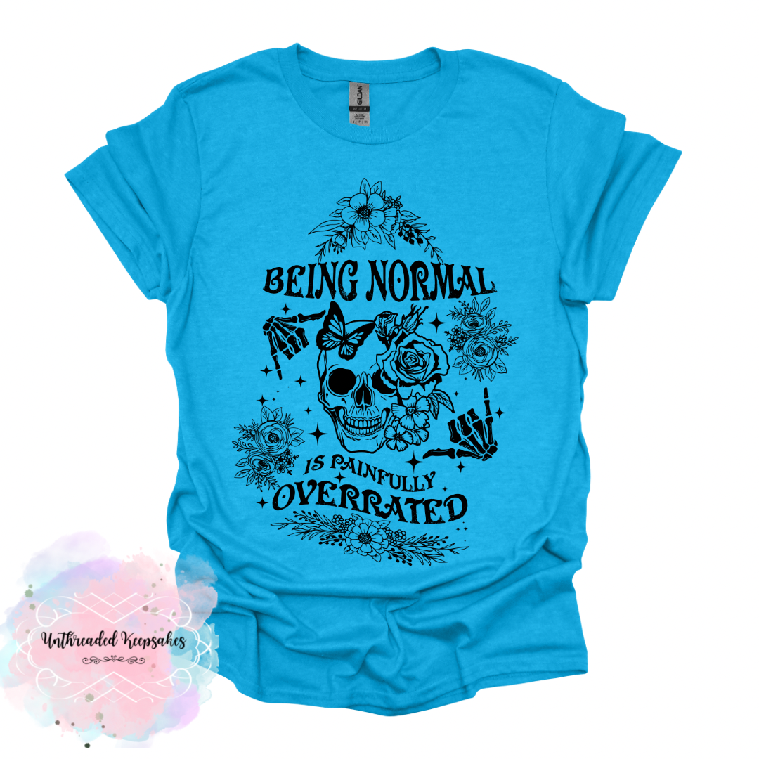 Being normal is overrated graphic t-shirt