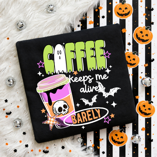 Coffee Keeps Me Alive Barely Halloween Shirt | Funny Spooky Coffee Lover Tee | Ghost Coffee Cup Graphic T-Shirt | Cute Fall Coffee Comfort Colors Tee