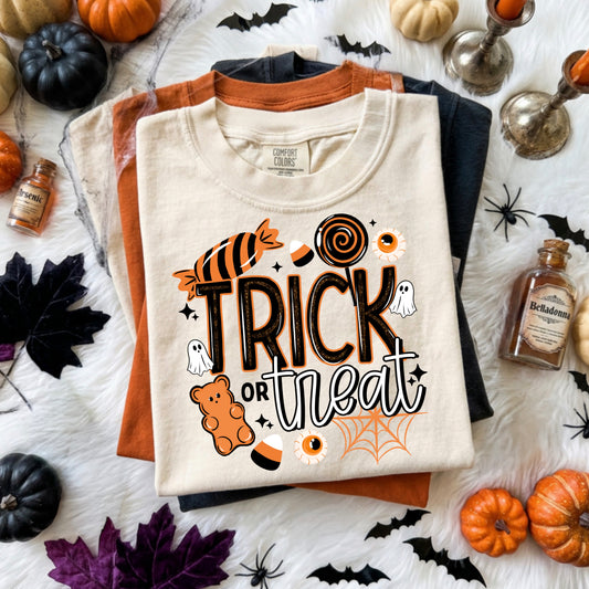 Trick or Treat Graphic Tee | Cute Halloween Shirt | Candy T-Shirt | Spooky Season Graphic Tee | Fall Pumpkin Shirt | Women's Halloween Apparel | Unisex Tee