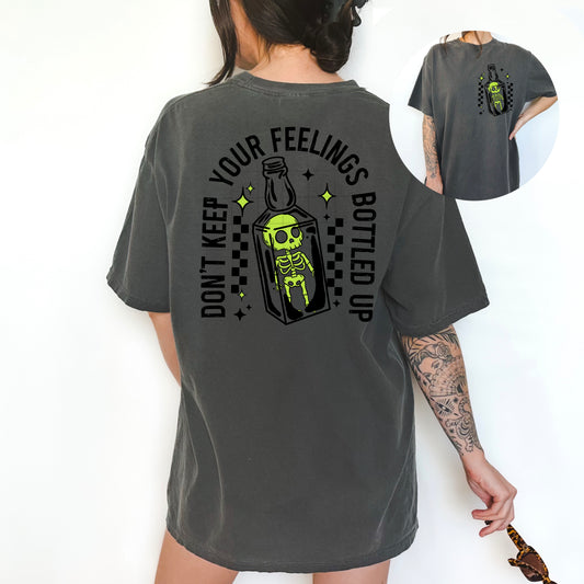 Don't Keep Your Feelings Bottled Up Skeleton Graphic Tee | Halloween Comfort Colors Shirt | Spooky Pocket & Back Print Tee | Skeleton Bottle Shirt | Funny Gothic Graphic Tee 💀🧪🖤