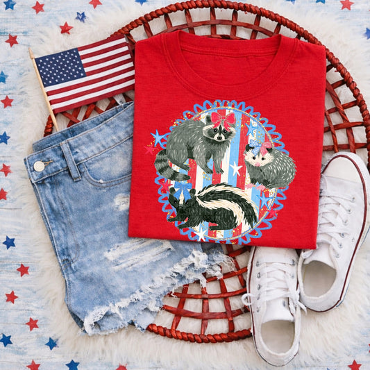 🦝 Patriotic Woodland Critters Tee | Fourth of July Raccoon, Skunk & Opossum Shirt | Cute Americana Animal Graphic Tee | Red White & Blue Summer Shirt 🇺🇸✨