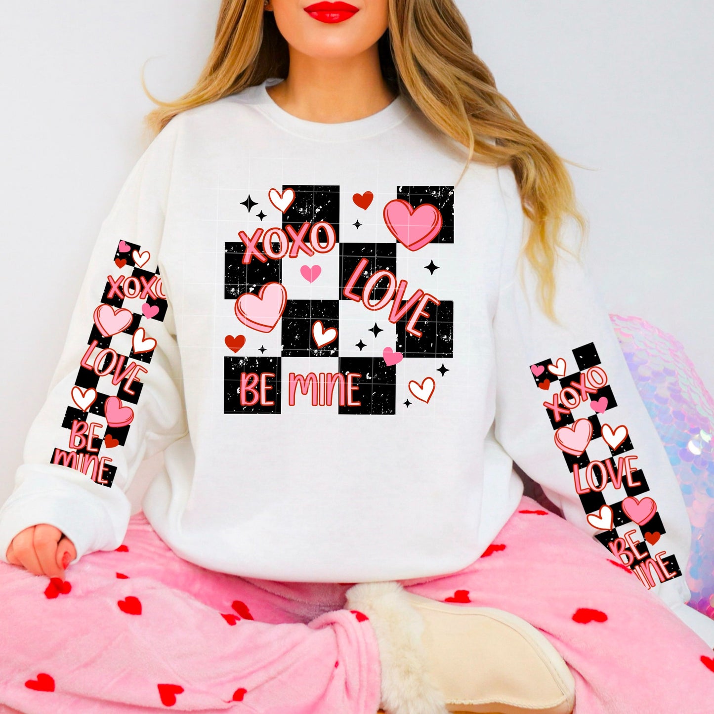XOXO Love Be Mine Valentine Sweatshirt with matching sleeve art for extra Valentine’s Day charm!– Hearts & Checkerboard Design with Sleeve Art | Cute Valentine Crewneck