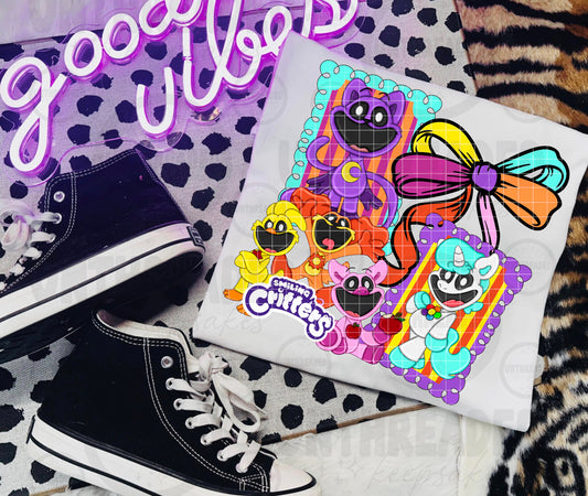 Smiling Critters Rainbow Graphic Tee | Cute Colorful Cartoon Statement Shirt