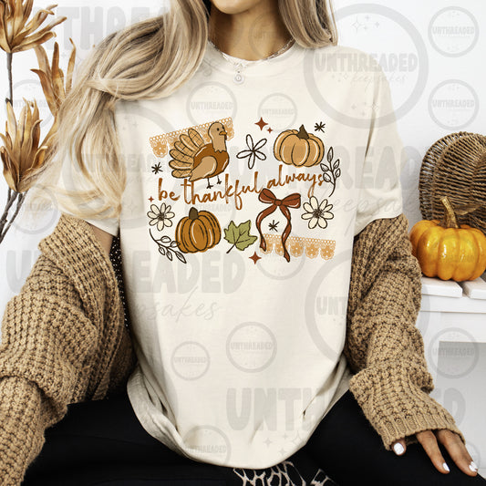 Be Thankful Always turkey, pumpkins, flowers, and bow graphic T-shirt mockup