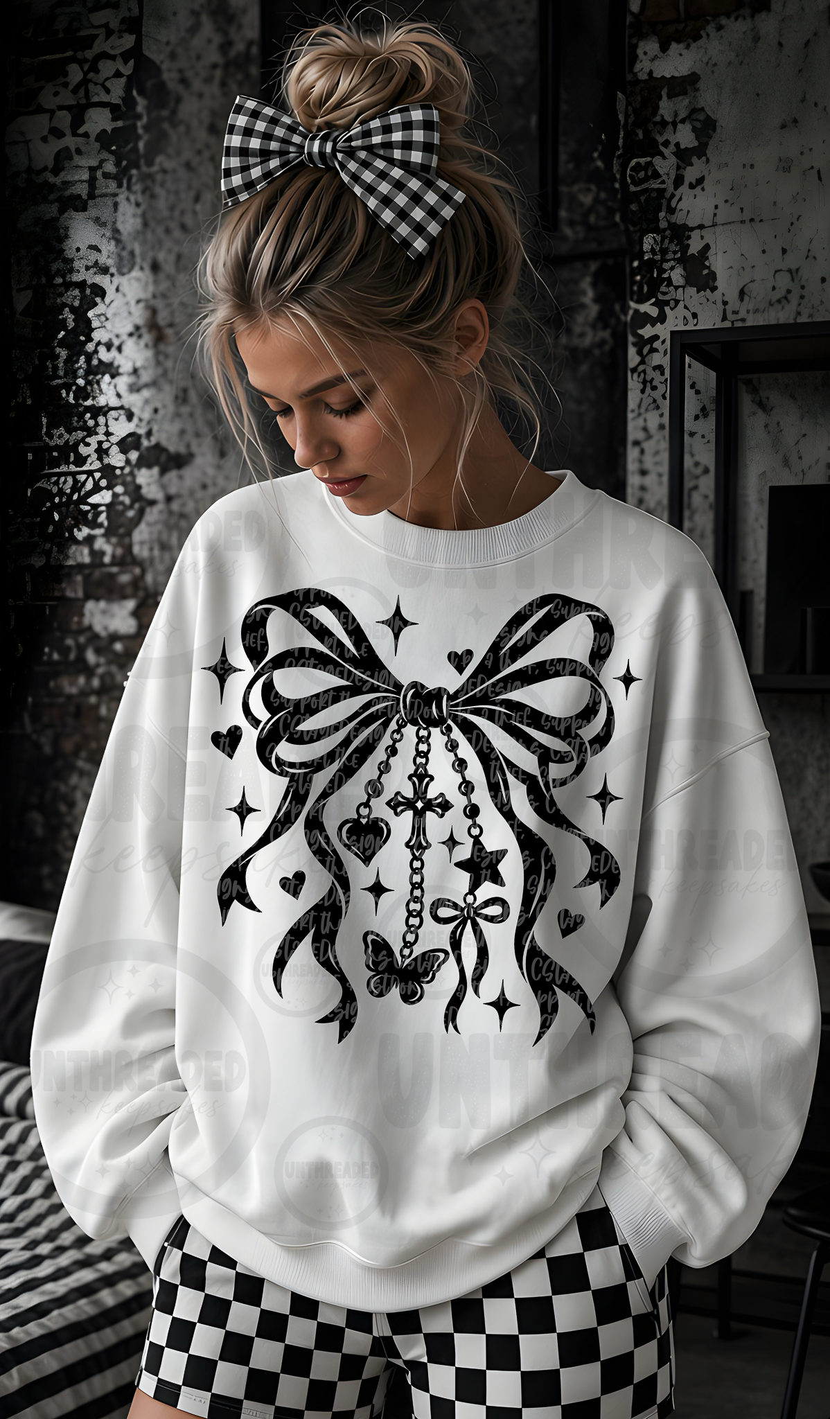 Black bow with cross and heart charm graphic shirt