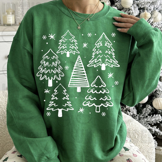 Green crewneck with five white outlined Christmas trees and snowflakes