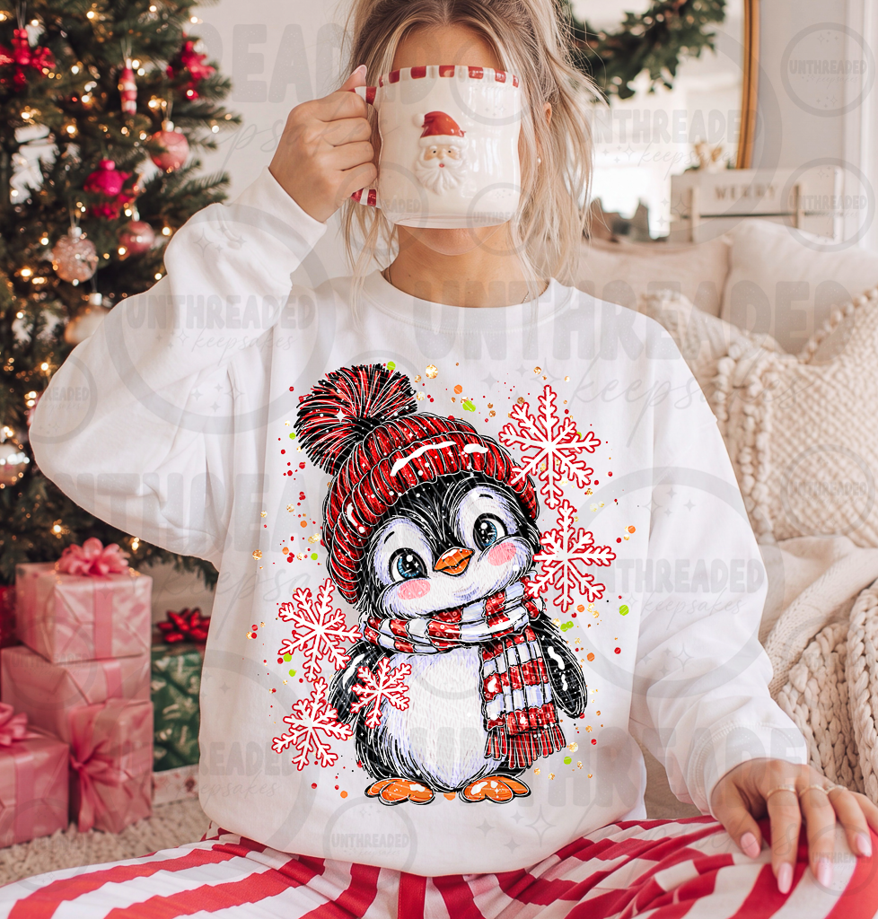 Christmas penguin red hat plaid scarf and snowflakes on white crewneck