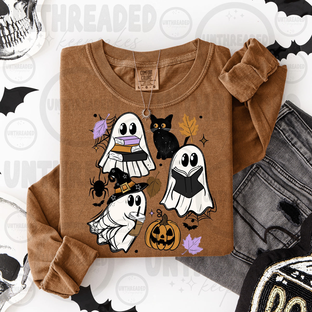 Brown crewneck with reading ghosts, black cat, pumpkin, and autumn accents