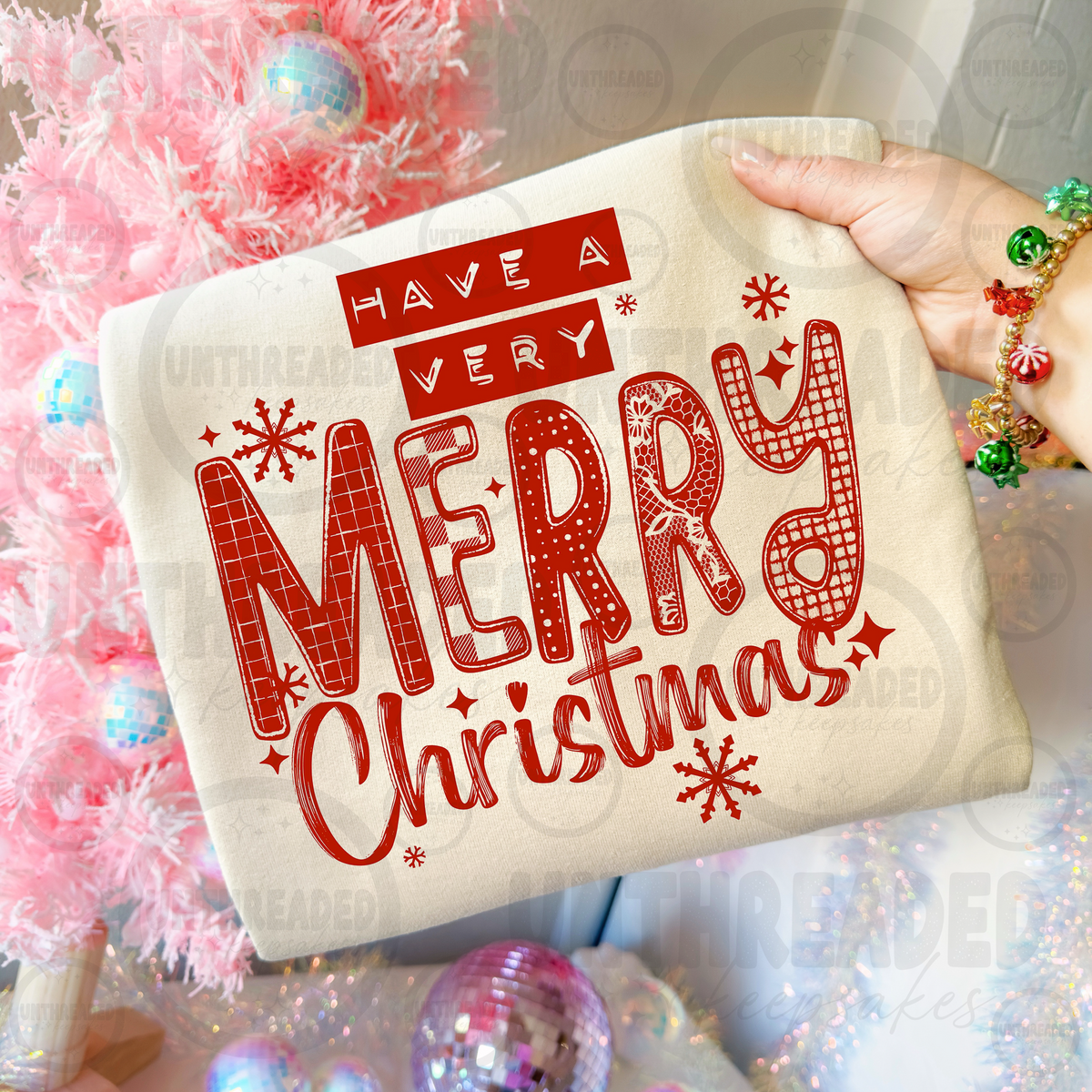 Have a Very Merry Christmas design on cream apparel