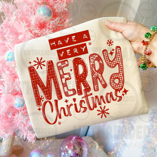 Have a Very Merry Christmas design on cream apparel
