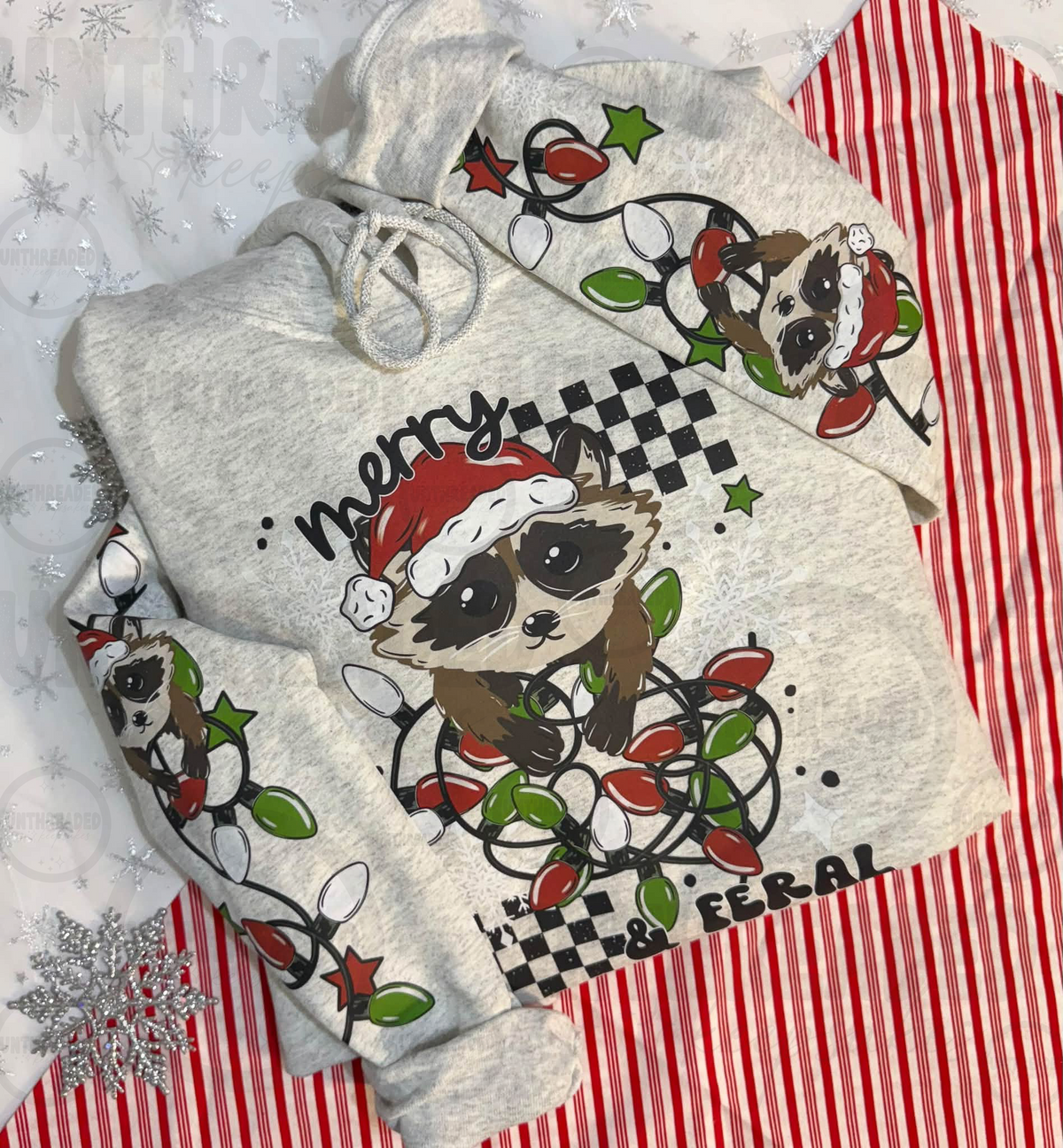 Merry and Feral raccoon Christmas lights sleeve print hoodie