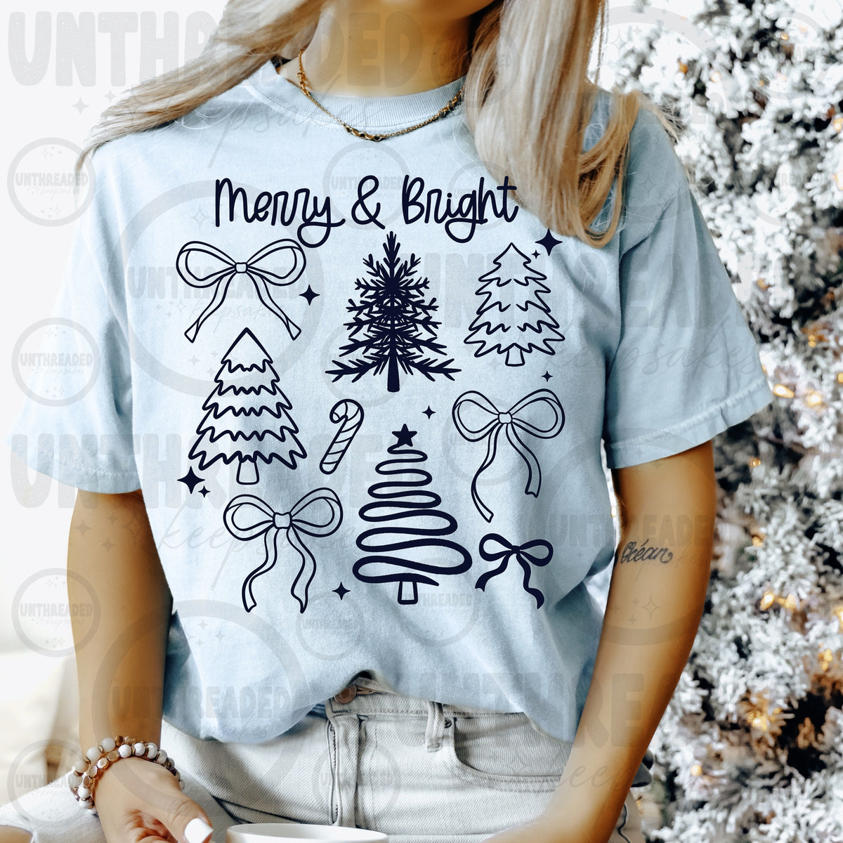 Light Blue Merry and Bright Christmas Trees and Bows Graphic T-Shirt mockup