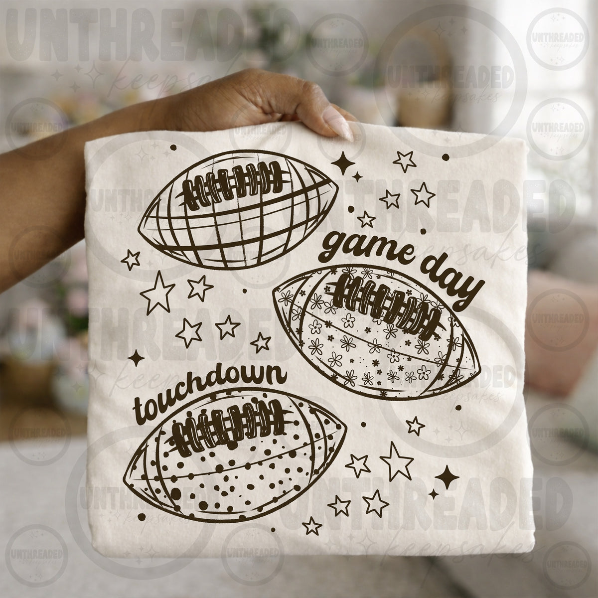 Cream Game Day Touchdown Patterned Footballs and Stars Graphic T-Shirt mockup